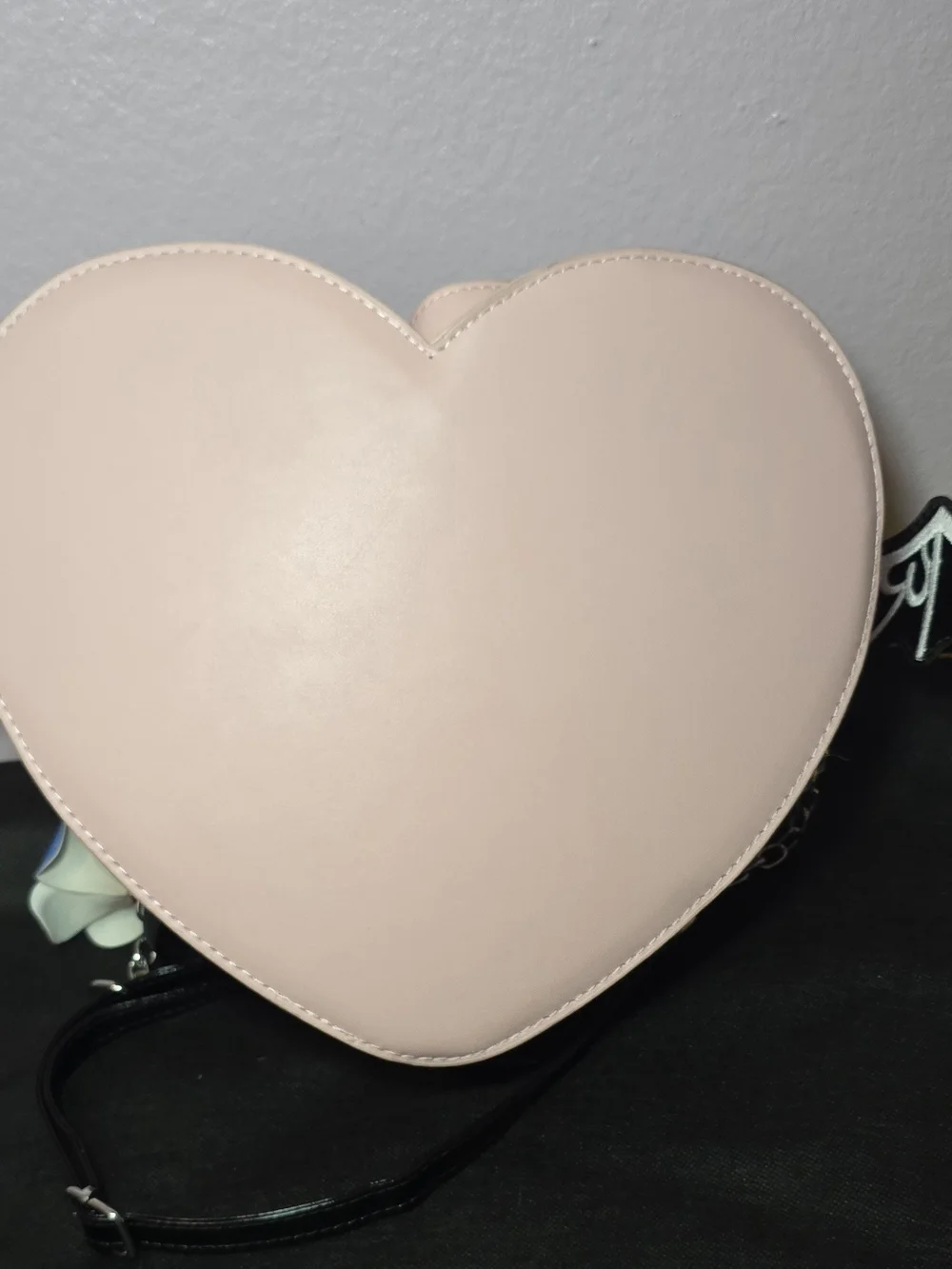 Heart-Shaped Pink Crossbody Bag with Gothic Ribbon Detail